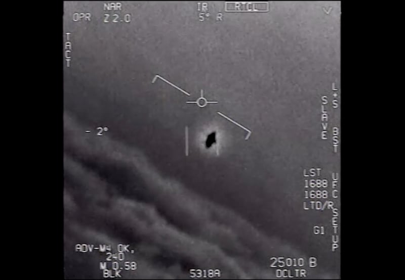 A still image taken from in-flight black and white video of an apparent alien encounter