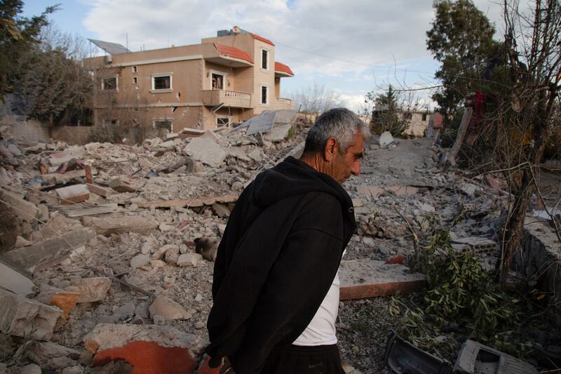 A man checks the damage in the aftermath of an Israeli strike in the southern Lebanese border village of Mais el-Jabal.