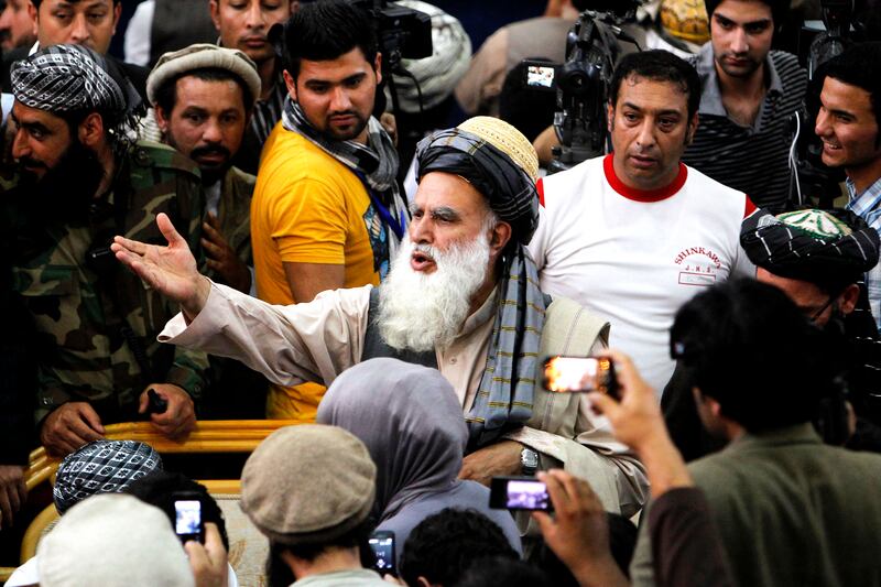 articles/2013/10/16/afghan-elections-the-warlords-are-back/131015-afghanistan-elections-sayyaf-tease_kesaeh