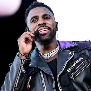 Jason Derulo sings into a microphone at Lollapaloza Festival Berlin