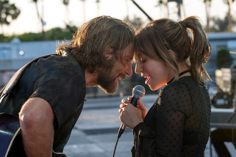 A photo still of Bradley Cooper and Lady Gaga in 'A Star Is Born'