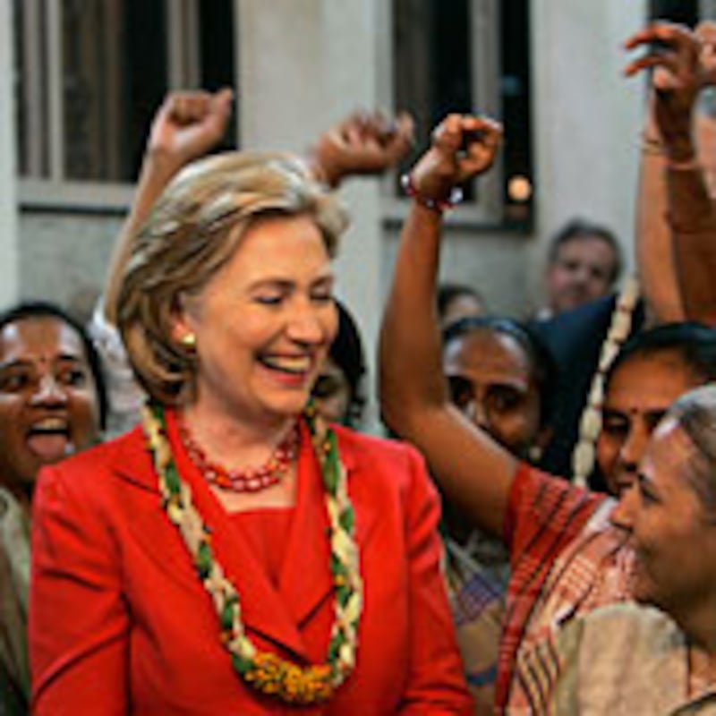 articles/2009/07/27/how-hillary-won-over-india/akbar-clinton-india_40035_ci09sw