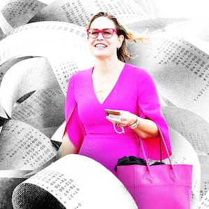 A photo illustration of Kyrsten Sinema in a big pile of receipts