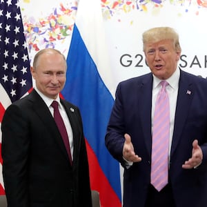 Russia's President Vladimir Putin and U.S. President Donald Trump attend a meeting on the sidelines of the G20 summit in Osaka, Japan June 28, 2019.