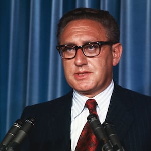 A photo including former White House advisor Henry A. Kissinger 