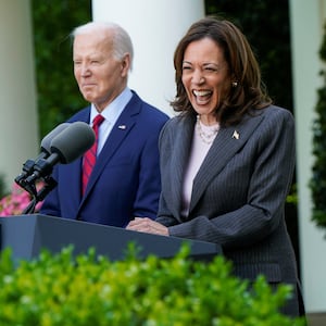 U.S. Vice President Kamala Harris delivers remarks, as President Joe Biden listens