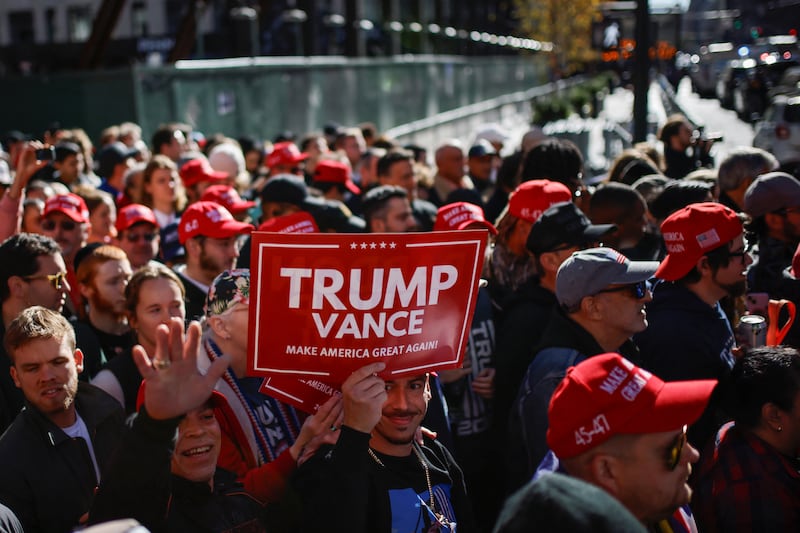 Supporters wait ahead of a rally for Republican presidential nominee and former U.S. President Donald Trump