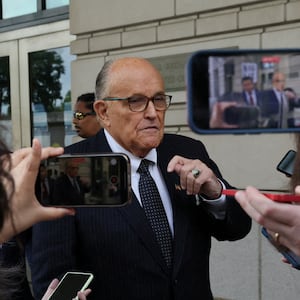 Former New York City Mayor Rudy Giuliani, an attorney for former President Donald Trump during challenges to the 2020 election results, exits U.S. District Court after attending a hearing in a defamation suit.