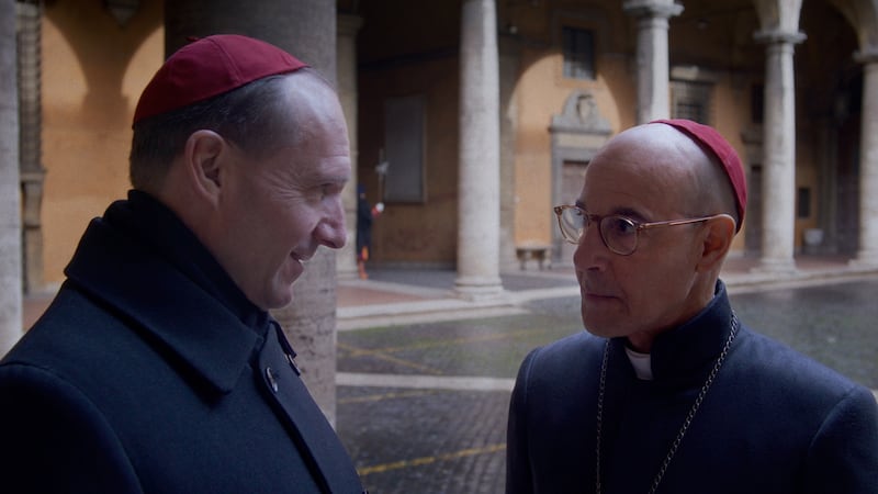 Ralph Fiennes as Cardinal Lawrence and Stanley Tucci as Cardinal Bellini