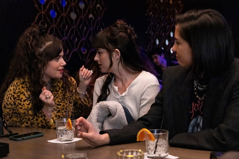 Molly Gordon, Dakota Johnson, and Sonoya Mizuno.