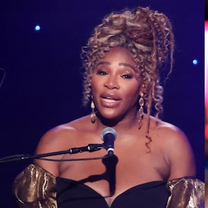 Serena Williams (left) speaks on stage, Los Angeles Lakers forward LeBron James (center) and Kansas City Chiefs kicker Harrison Butker (right) during a press conference before Super Bowl LVIII.