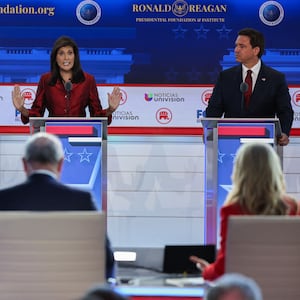 Former South Carolina Governor Nikki Haley speaks as former New Jersey Governor Chris Christie and Florida Governor Ron DeSantis listen during the second Republican candidates' debate