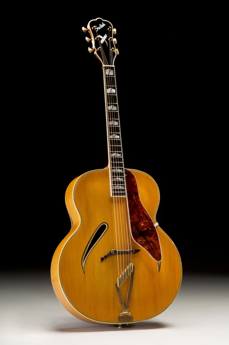 galleries/2014/04/01/a-collection-of-250-remarkable-acoustic-guitars-goes-on-the-auction-block-photos/acoustic-guitar-auction-1939-gretsch_b9u9xp