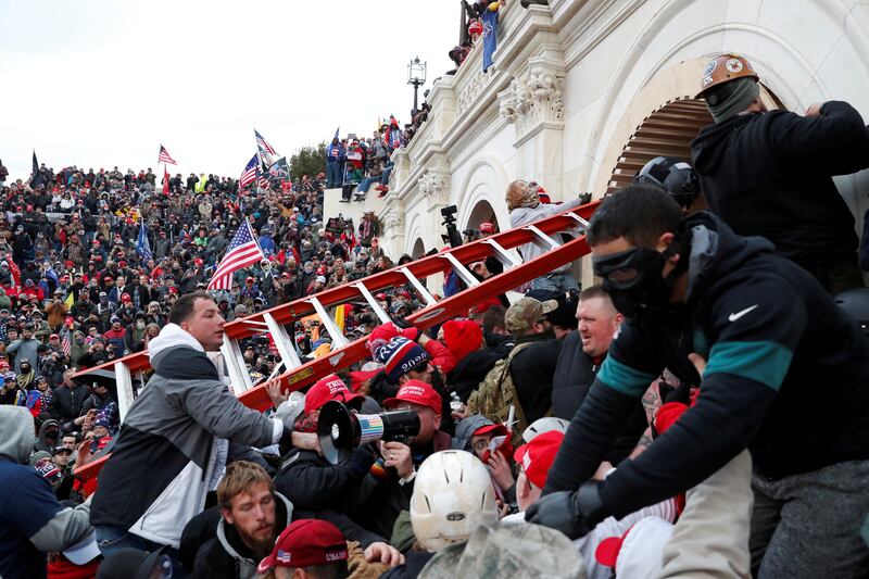 Pro-Trump protesters storm into the U.S. Capitol on Jan 6