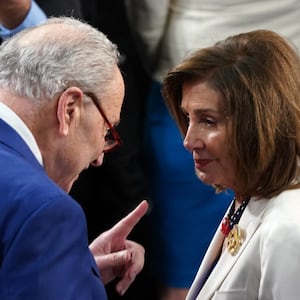 Chuck Schumer talking to Nancy Pelosi. 