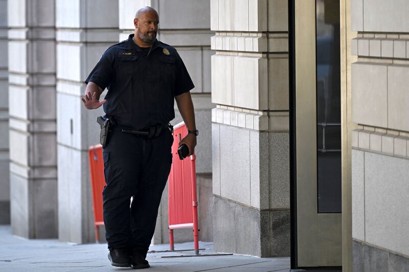 Harry Dunn waves as he arrives at the E. Barrett Prettyman Courthouse in Washington, DC