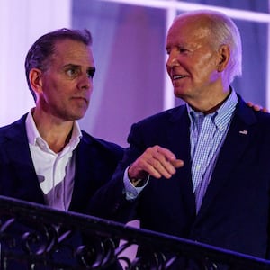 President Joe Biden talks to his son, Hunter Biden, following the fireworks on the National Mall earlier this month.