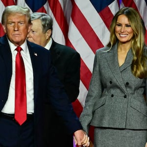 Donald Trump, Melania Trump, Barron Trump, Viktor Knavs, JD Vance, and Ivanka Trump leave at the conclusion of an election night event at the West Palm Beach Convention Center in West Palm Beach, Florida, early on Nov. 6, 2024.