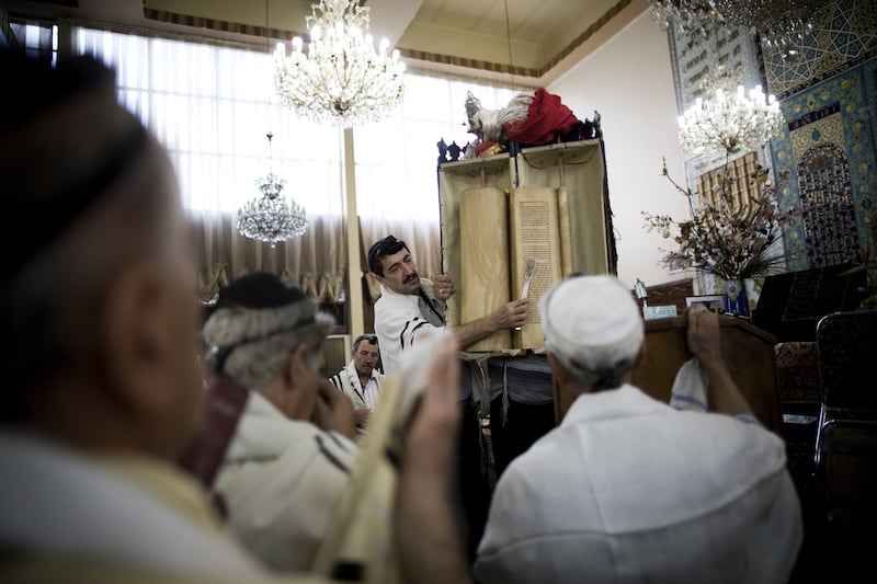 articles/2013/10/10/seven-things-you-might-not-know-about-iranian-views-of-israel/OZ_Tehran_Synagogue_Torah_reading_rz7anv