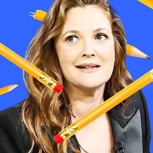 A photo illustration of Drew Barrymore with broken pencils around her on a yellow background