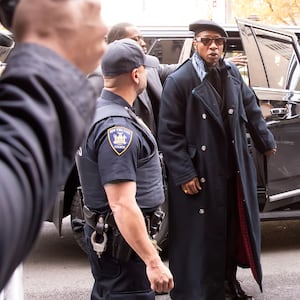 Jonathan Majors and Meagan Good are seen arriving at court on December 4, 2023 in New York, New York. 