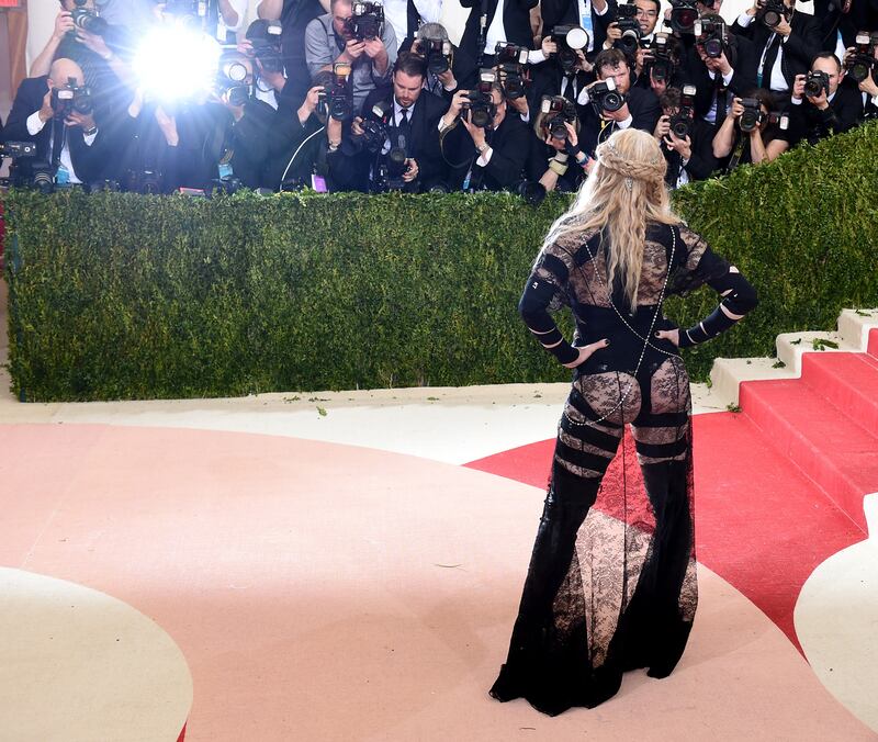 articles/2016/05/03/how-the-met-gala-delights-in-shock-starring-beyonc-madonna-and-katy-perry/160502-crocker-met-fashion-embed_wcttme