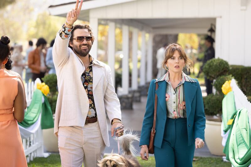 A photo of Jake Johnson and Ophelia Lovibond in the new season 2 of Minx on STARZ.