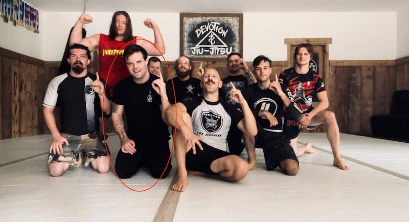 An image posted on Telegram on Aug. 11, 2024, shows Ian Elliott with members of the far-right, Virginia-based Devotion Jiu-Jitsu group.