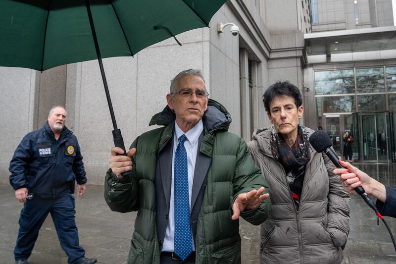 Sam Bankman-Fried’s parents, Barbara Fried and Allan Joseph Bankman, depart federal court after his sentencing. 