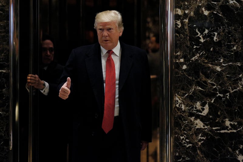 President-elect Donald Trump greets members of the press at Trump Tower in Manhattan, New York City