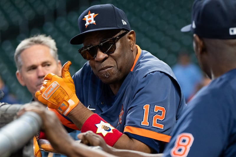 A photo of Houston Astros manager Dusty Baker Jr. watching batting practice.