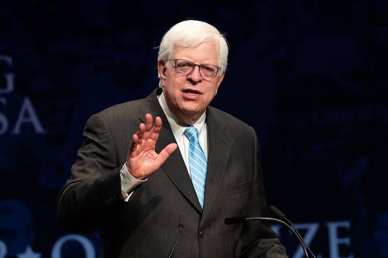 A photograph of Dennis Prager speaking at the Turning Point High School Leadership Summit