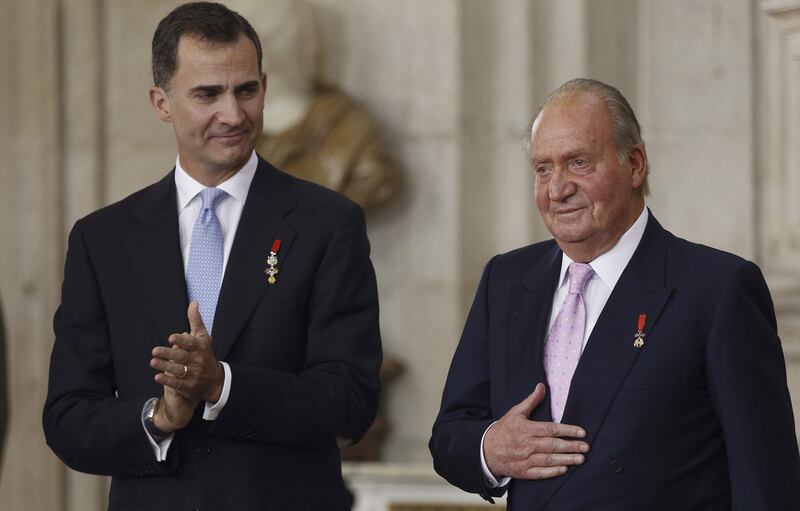 Prince Felipe of Spain and King Juan Carlos of Spain.