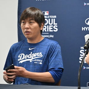 Los Angeles Dodgers' Shohei Ohtani (R) and his interpreter Ippei Mizuhara (L) attending a press conference at Gocheok Sky Dome in Seoul, on March 16 2024.