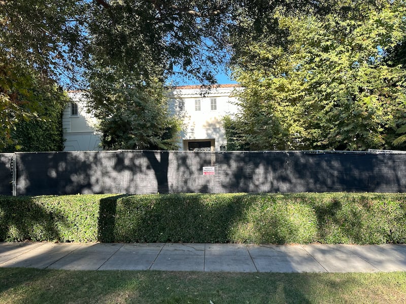 Construction barriers are erected outside the former Menendez family home in Beverly Hills, California.