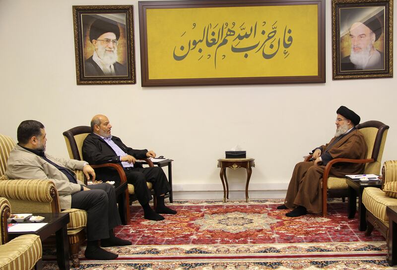 Lebanon's Hezbollah leader Sayyed Hassan Nasrallah meets with Hamas officials, Khalil al-Hayya and Osama Hamdan.