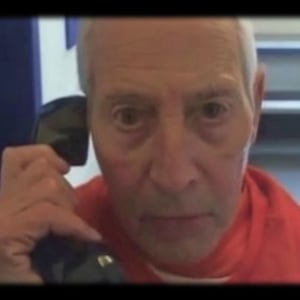 Robert Durst on a prison phone in a still from ‘The Jinx Part Two’