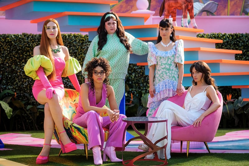 A photo production still of Hari Nef, Alexandra Shipp, Sharon Rooney, Ana Cruz Kayne, and Emma Mackey as Barbies. 