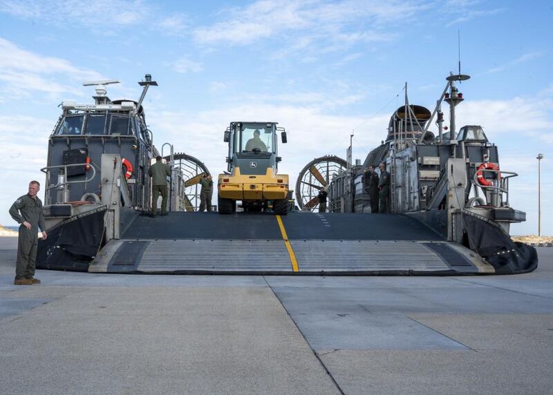 U.S. Navy personnel securing and transporting the remnants of a Chinese spy balloon