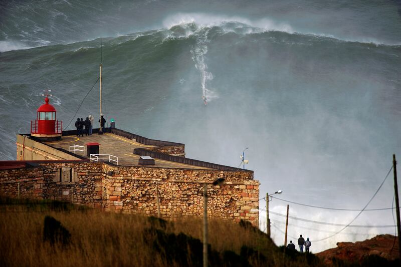 articles/2013/01/30/surfer-garrett-mcnamara-conquers-his-100-foot-wave/130139-jacobsohn-mcnamara-bigwave-tease-embed_vhzdsr