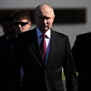 Russian President Vladimir Putin walking.