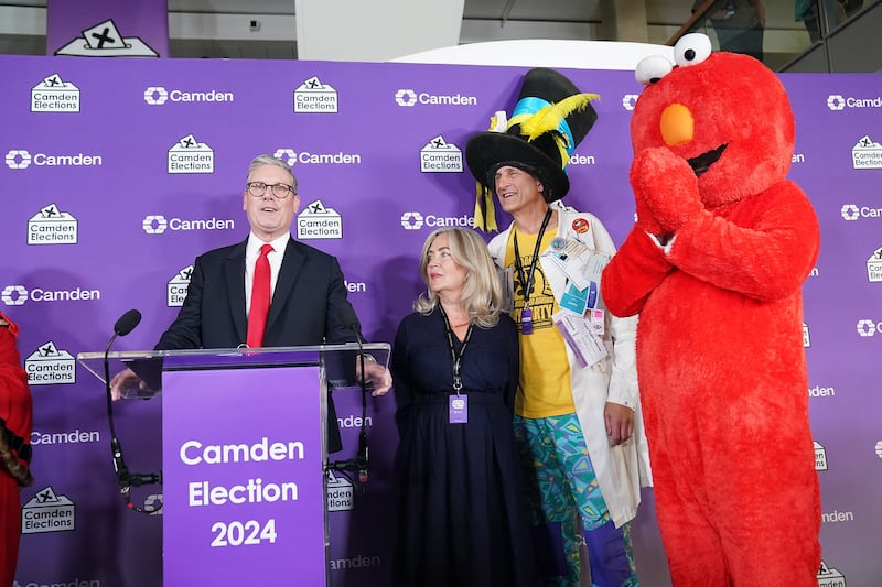 Labour leader Sir Keir Starmer, Nick the Incredible Flying Brick and Bobby "Elmo" Smith.