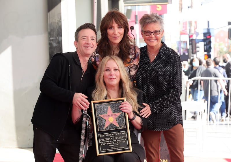 (L-R) David Faustino, Katey Sagal, Amanda Bearse, and Christina Applegate attend a ceremony honoring Christina Applegate with a star on the Hollywood Walk Of Fame on November 14, 2022