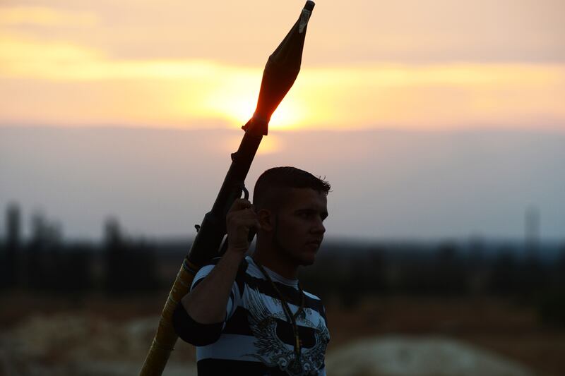 articles/2012/10/16/are-foreign-jihadists-gaining-influence-inside-the-syrian-rebel-forces/syrian-rebels-day_atngn5