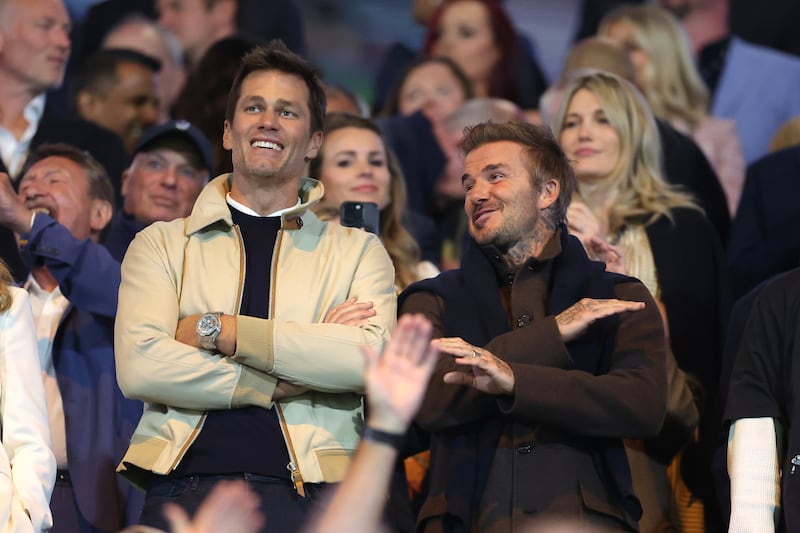 BIRMINGHAM, ENGLAND - SEPTEMBER 16: Tom Brady, Minority Owner of Birmingham City (L) with David Beckham to the Sky Bet League One match between Birmingham City FC and Wrexham AFC at St Andrew’s at Knighthead Park on September 16, 2024 in Birmingham, England. (Photo by Alex Pantling/Getty Images)