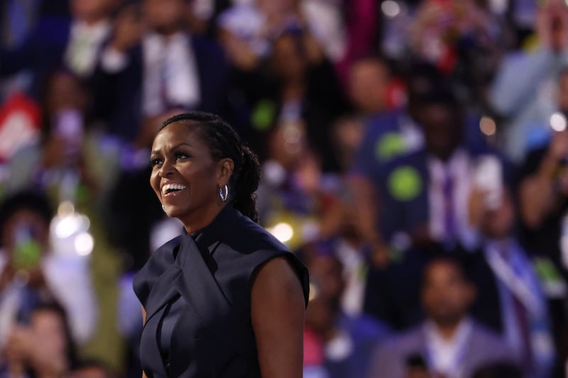 Michelle Obama takes to the stage during the second day of the Democratic National Convention in Chicago on August 20, 2024.