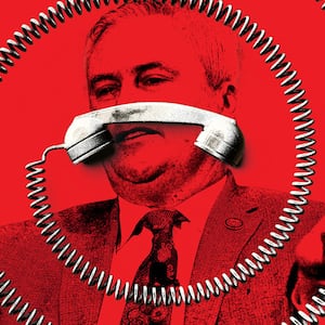 A photo illustration of James Comer with a phone and cord spiraling around him.