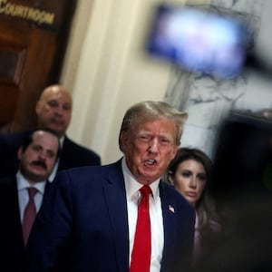 Former President Donald Trump speaks as he attends the Trump Organization civil fraud trial.