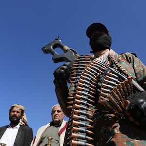 A Houthi policeman taking part in a protest against U.S.-led strikes on Houthi targets in Yemen. 