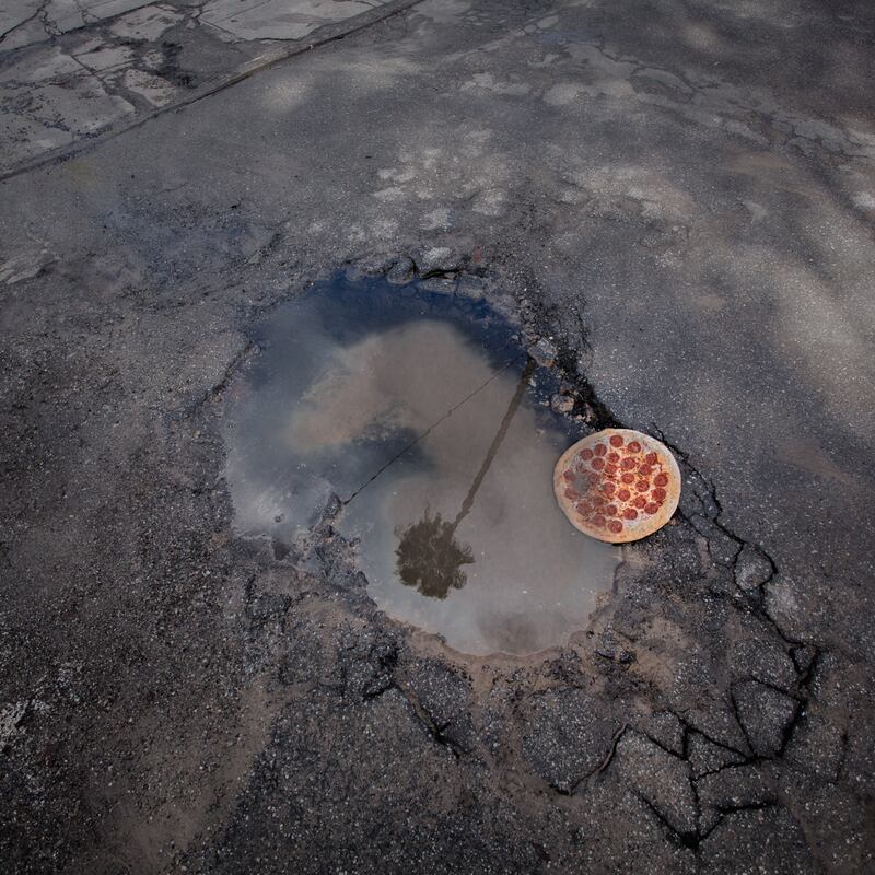 galleries/2014/03/15/pizza-in-the-wild-jonpaul-douglass-photographs-our-favorite-food-in-nature/140312-puddle_pizza_iaff7y